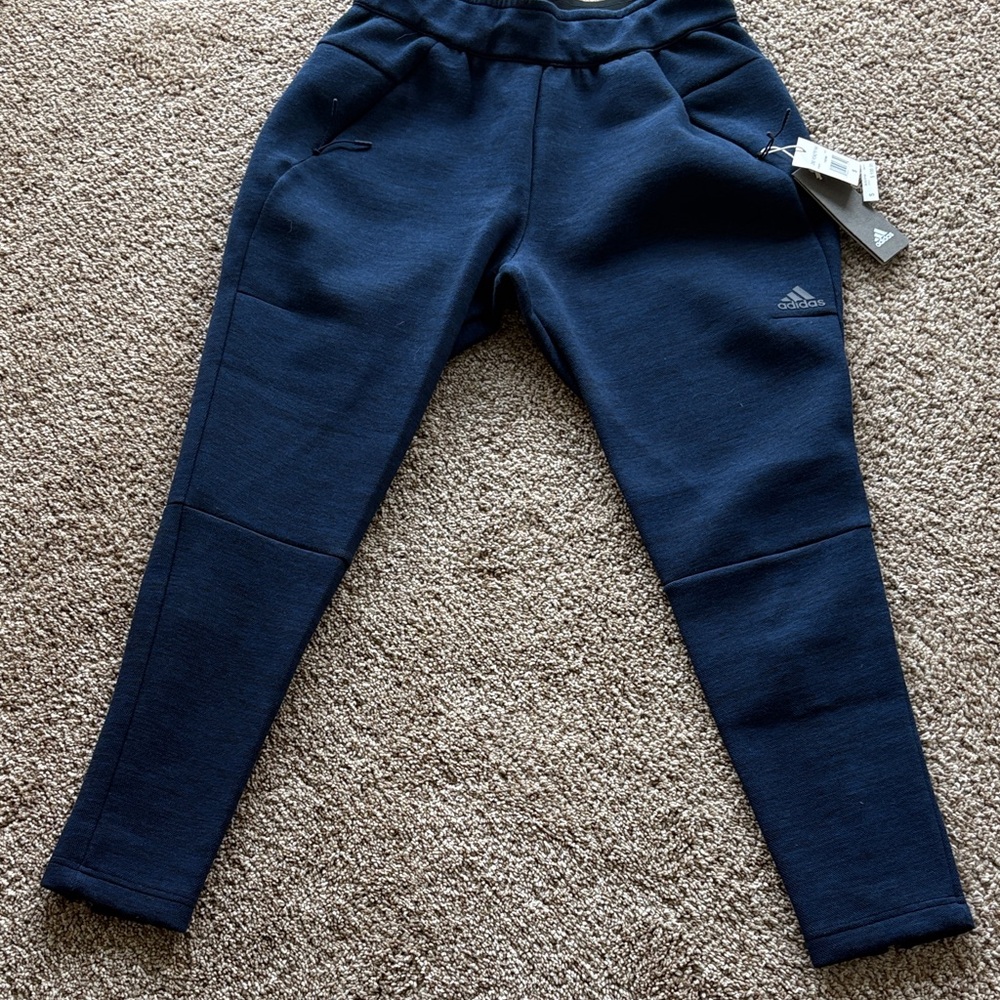 Adidas ZNE Road Trip Pant
Dark Blue. 
Womens size Small. 
New with tags